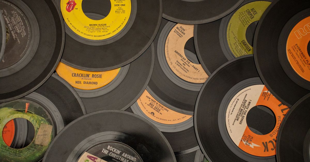 A collection of vintage vinyl records showcasing iconic music labels and artists.